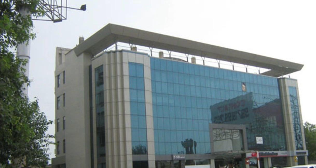 Commercial office building with structural glass façade